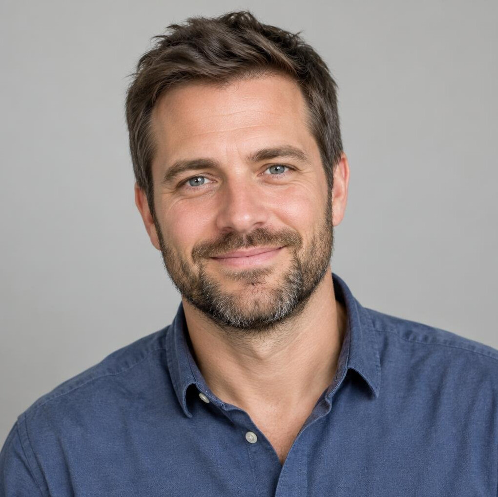 Portrait of a man with a beard looking at the camera